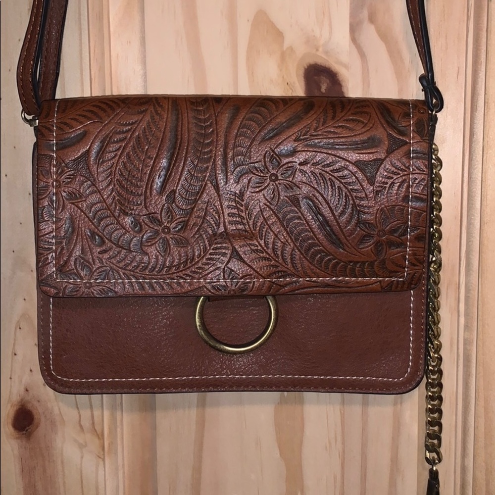 Leather hand clutch bag or purse.